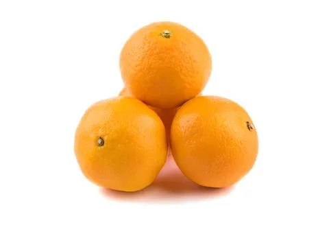 Three fresh oranges stacked together on white background 库存照片
