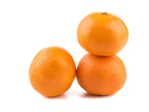 Three fresh oranges stacked on white background 库存照片