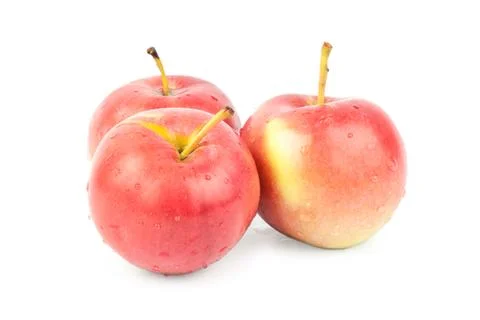 Three fresh red apples. isolated on white background. close-up Stock Photos