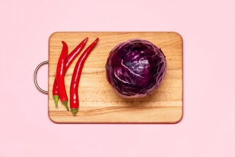 Three Fresh Red Chilli Pepper Near One Violet Cabbage Stock Photos