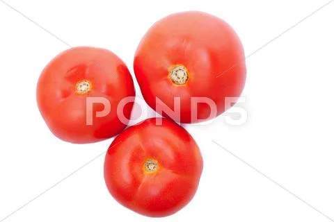 Three fresh tomatoes isolated over white background Stock Photos