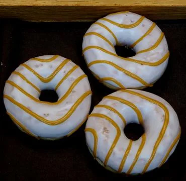Three Freshly Baked Donuts Stock Photos
