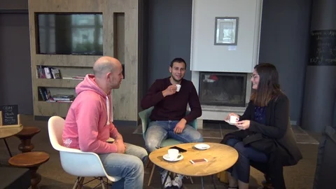 Three Friends Chatting In a Tea Room Stock Footage 123513003