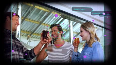 Three friends clinking glasses and sipping beer at brewery tanks with AR overlay Stock Footage 333232848