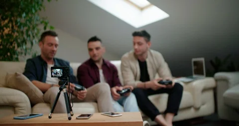 Three friends doing a vlog video together. Shot in slow motion Stock Footage 117185515