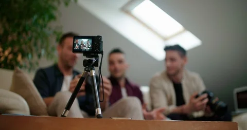 Three friends doing a vlog video together. Shot in slow motion Stock Footage 117185714