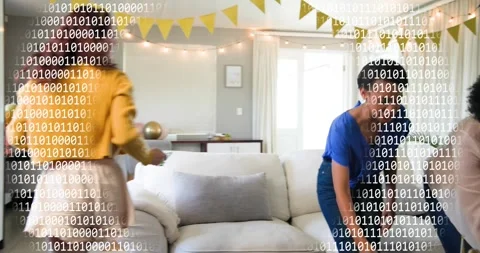 Three friends laughing triggers binary code flashing while serving 30th birthday Stock Footage 318139856