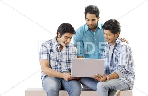 Three Friends Looking At Computer