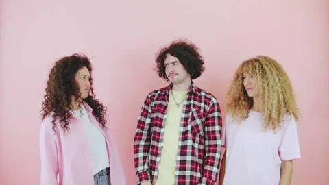 Three friends refusal giving up something and saying no on pink background, show Stock Footage 300419908