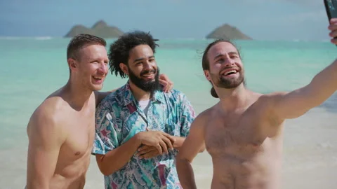Three Friends Sharing Laughs and Making Memories on Tropical Beach Stock Footage 274164765