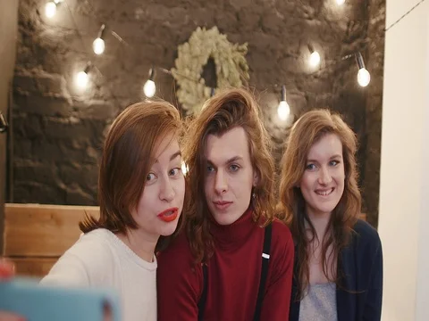 Three friends taking selfie with smart phone 스톡 동영상 72491608