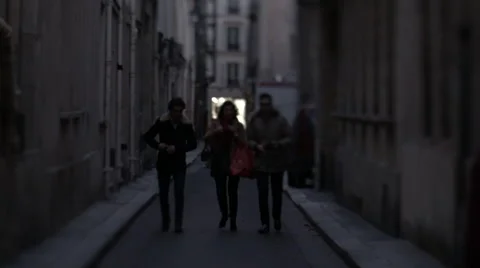 Three Friends Walk Down Paris Alley Stock Footage 47209330