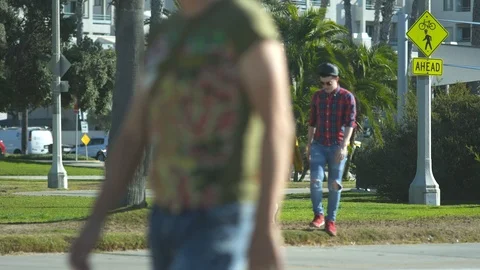 Three friends walk in a park Stock Footage 86537386