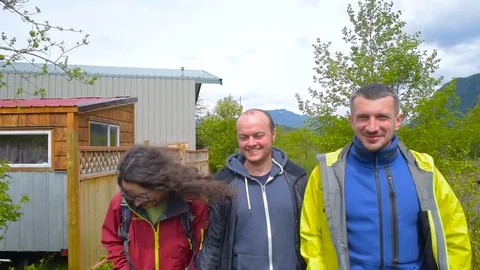 Three friends walking and having fun in countryside Stock Footage 82731020