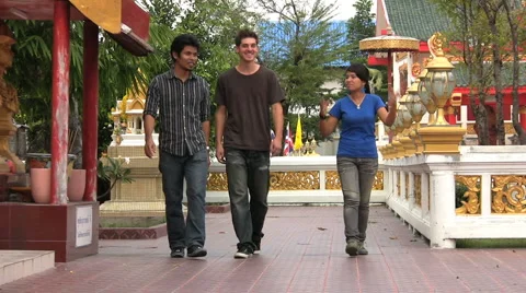 Three Friends Walking To The Temple Stock Footage
