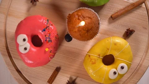 Three fun colorful donuts with faces Video stock 96312021