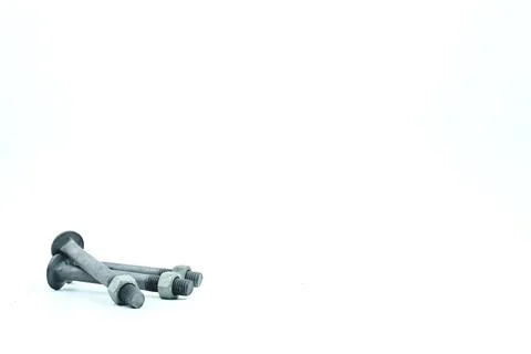 Three Galvanized Bolts With Nuts Stock Photos