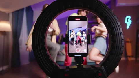 Three Gen Z friends record trending reels for social media with K-pop dance Stock-Footage 247101265