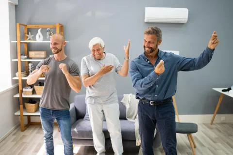 Three Generation Men Dancing And Exercising Stock Photos