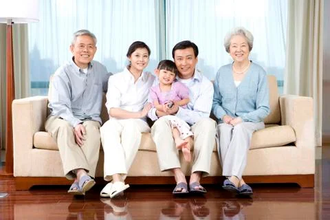 Three generations on couch Stock Photos