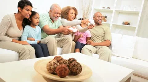 Three Generations Ethnic Family Playing Electronic Games Stock Footage