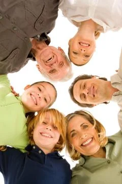 Three generations family looking at camera isolated on white background Stock Photos