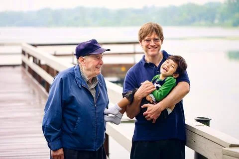 Three generations interacting together Stock Photos