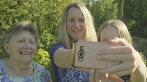 Three generations taking a selfie Stock Footage 89983865