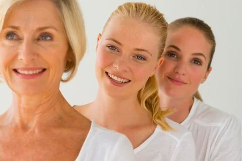 Three generations of women in a row Stock Photos