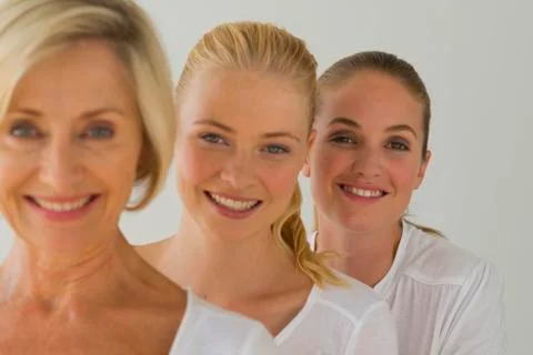 Three generations of women in a row Stock Photos