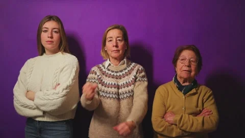 Three generations of women showing stop sign with crossed arms Stock Footage 296711673