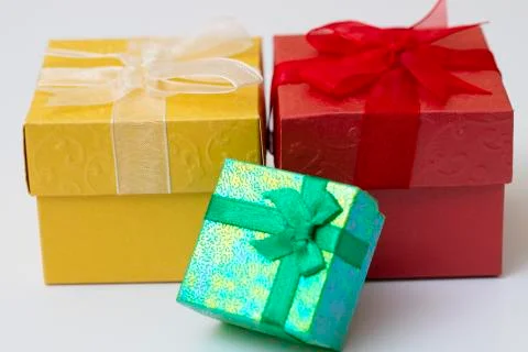 Three gift box with  ribbon isolated on white background. Stock Photos