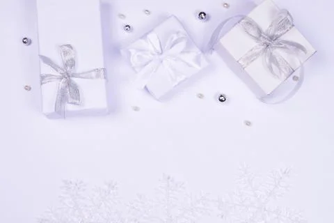 Three gift boxes on white background. Stock Photos