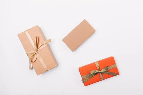 Three gifts on white table, view from above 스톡 사진