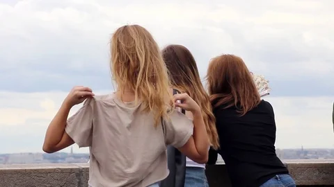 Three girlfriends enjoying the view Stock Footage 78500361