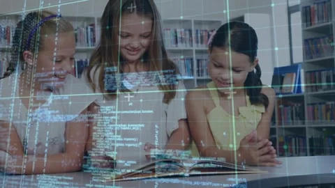 Three girls at library table, third joining, turning open book pages, code Stock Footage 330192114