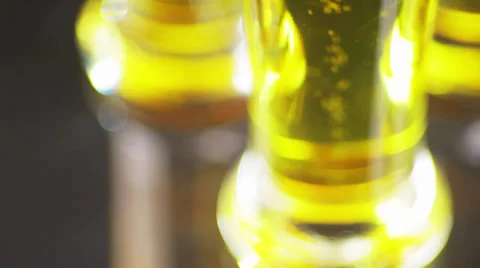 Three glasses of beer rotate, the bubbles rise, bottom 스톡 동영상 39720160