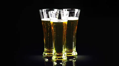 Three glasses of beer rotate Video stock 39877488