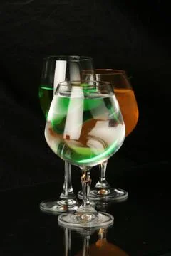 Three glasses on a black background Stock Photos