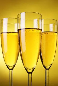 Three glasses of champagne Stock Photos