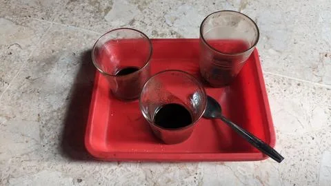 Three glasses of coffee finished Stock Photos