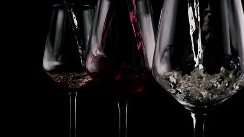 In three glasses wine is poured. Slow motion Stock-Footage 75955450