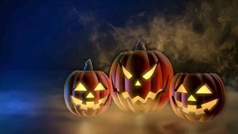 Three glowing Halloween pumpkins with eerie smoke Stock-Footage 334104835