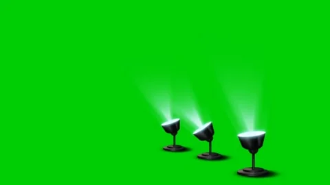 Three Glowing Spotlights Emitting Beams on Green Screen Background. Stockbeeldmateriaal 332552059