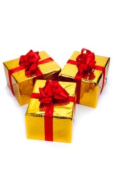 Three gold gift boxes Stock Photos