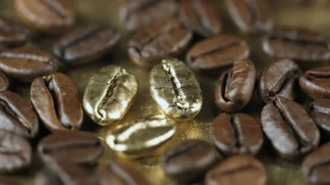 Three gold grains. Roasted vietnamese coffee bean. Fragrant coffee beans scrolls Stock Footage 154153033