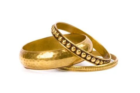 Three golden bracelets Stock Photos