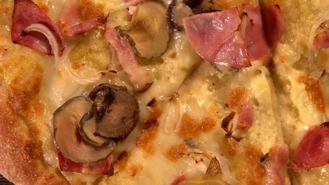 Three gourmet pizzas with assorted toppings Video stock 93914101