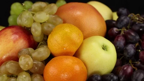Three grape varieties, apples, orange and grapefruit Stock Footage 124300601