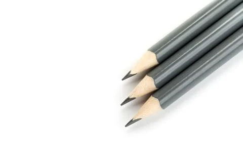 Three  gray triangular pencil isolated.on white background Stock Photos